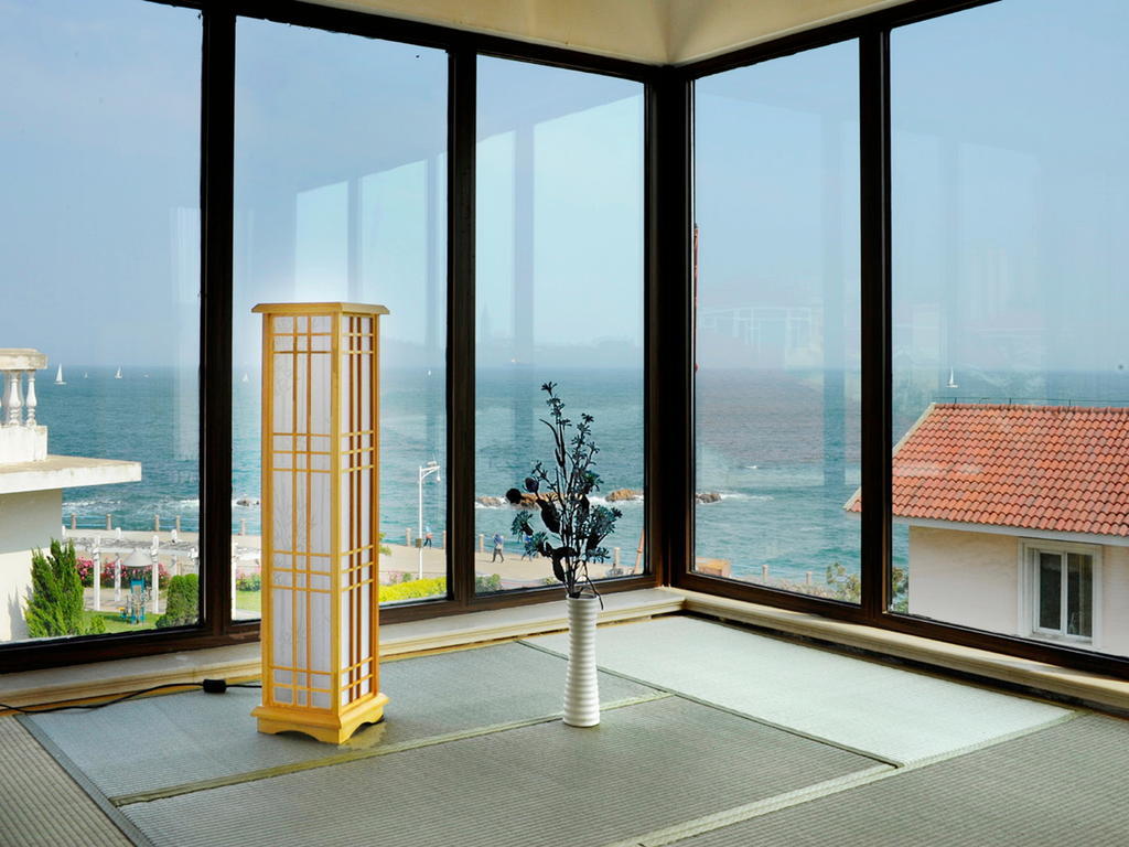 Villa Inn No.21 Seaside Циндао Номер фото